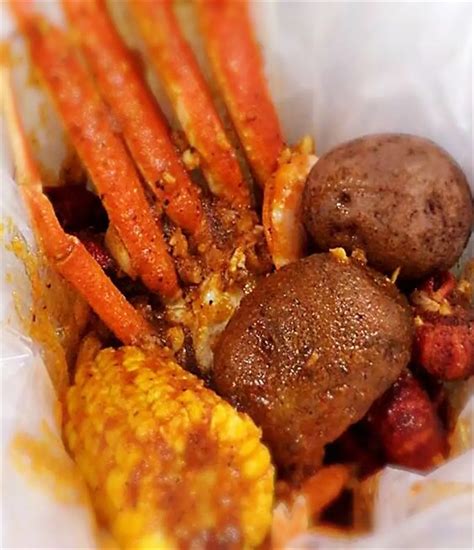 Cajun crab hut - Instructions. Prepare your vegetables by cutting into halves or sections. On one tray add the potatoes, onions, carrots, garlic, onions and lemons. On a second tray add the corn, sausage and mushrooms. Add the first tray to a boiling pot of water, seasoned with 2 cups of the crab boil seasoning and boil for 10 minutes.